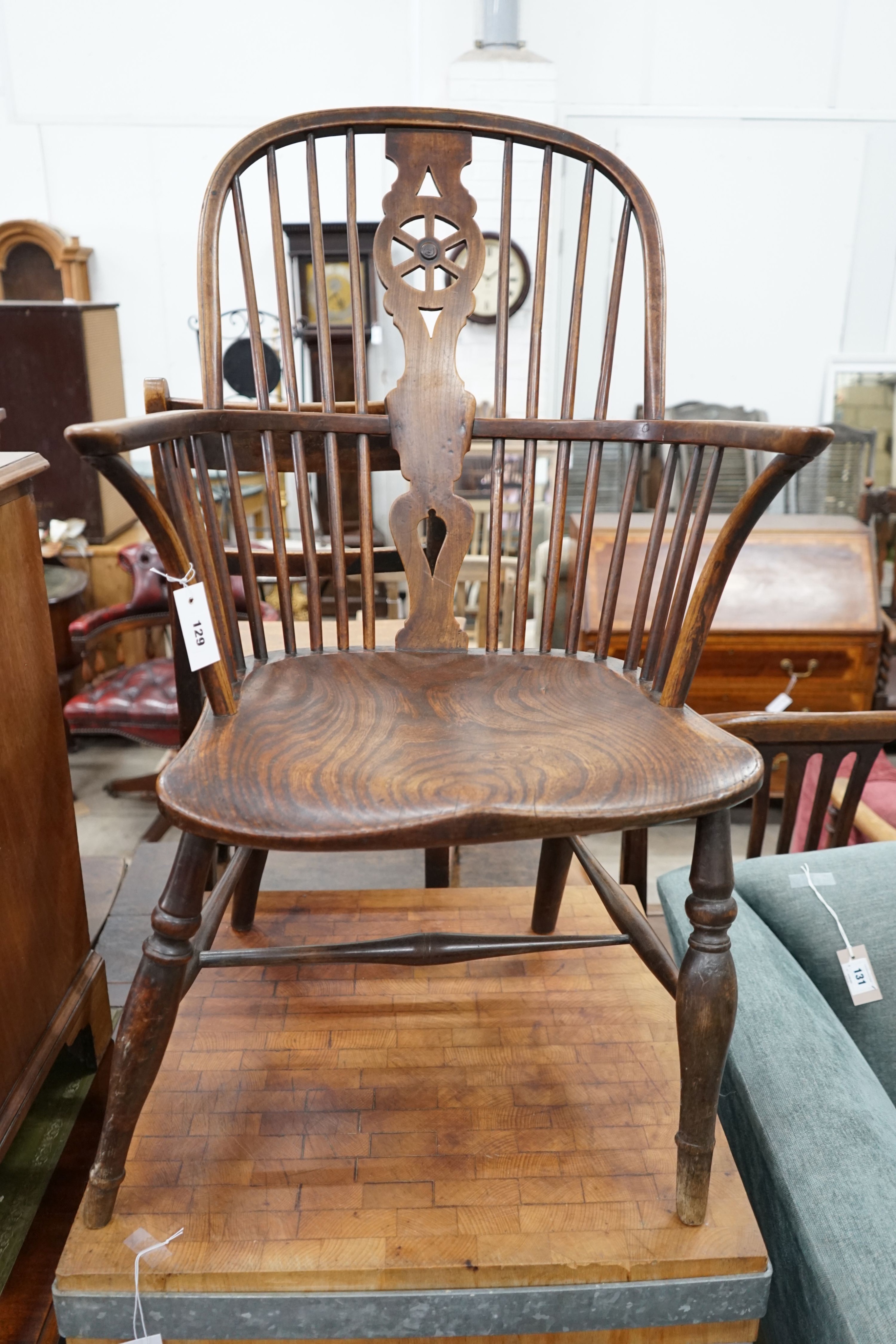 A 19th century ash, elm and beech Windsor wheelback armchair, width 57cm, depth 43cm, height 98cm